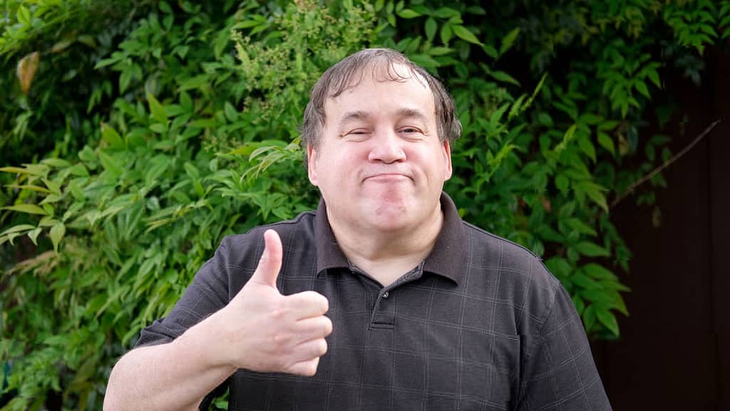 Adult man giving the thumbs up sign
